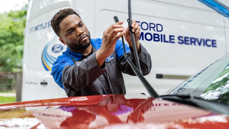 Lasco Ford mobile service technician replacing wiper blades Fenton Michigan