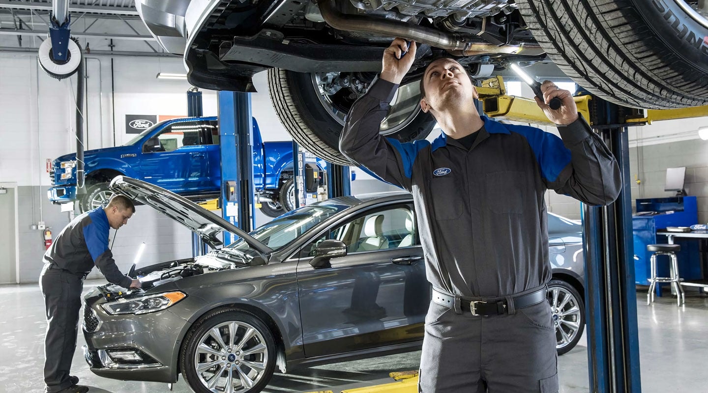 Lasco Ford service technicians working in service department Fenton Michigan