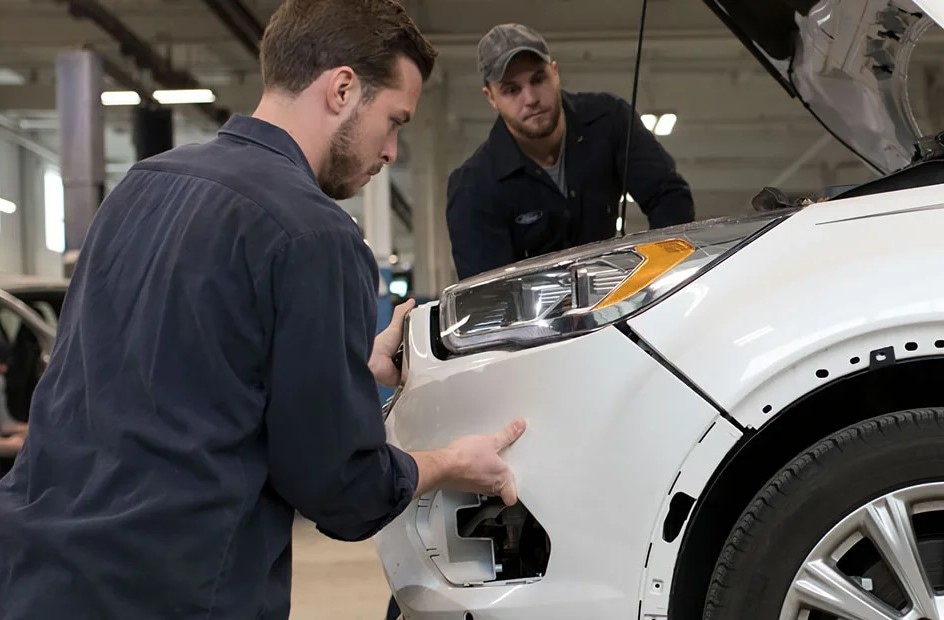 Ford F-150 front bumper collision repair technicians Lasco Ford Fenton Michigan