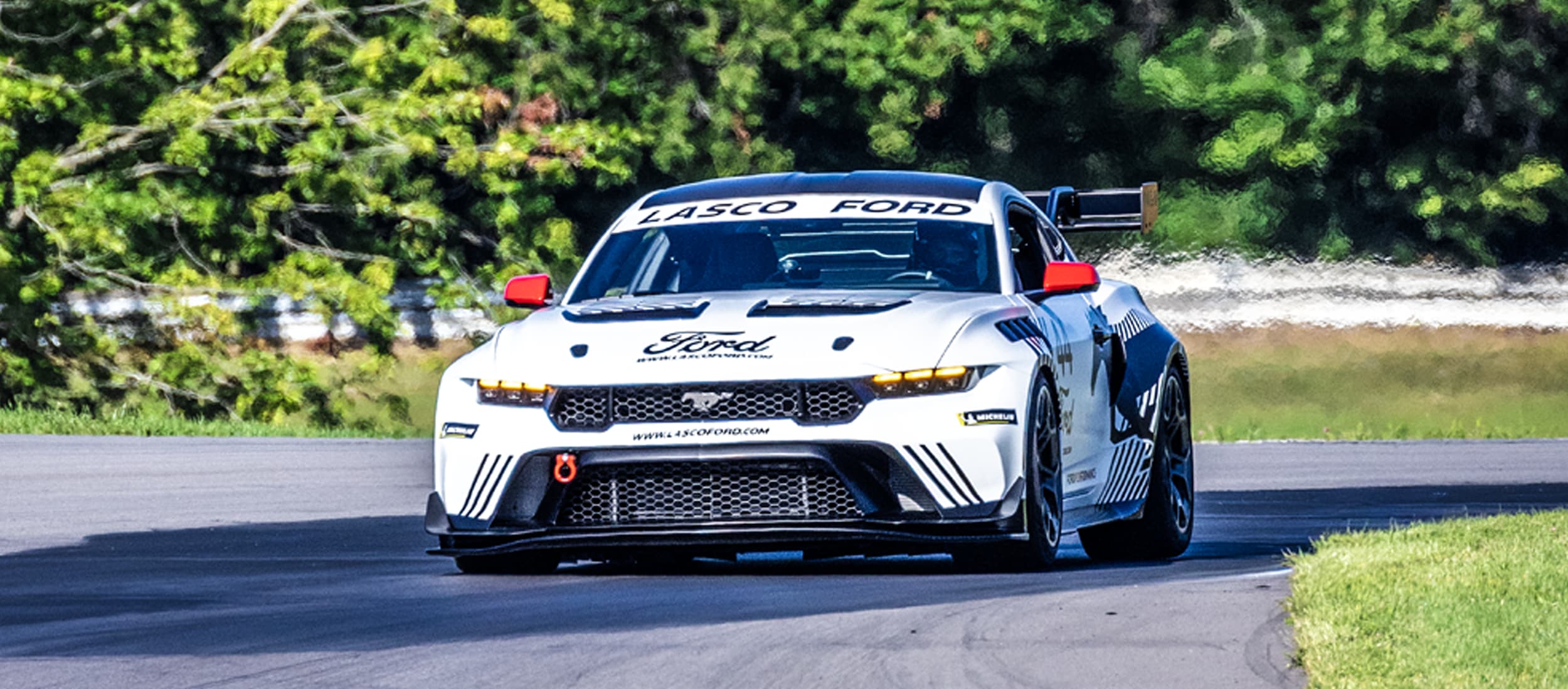 Jay Lasco driving the Lasco Ford Mustang GTD on track - Authorized GTD Dealer Michigan