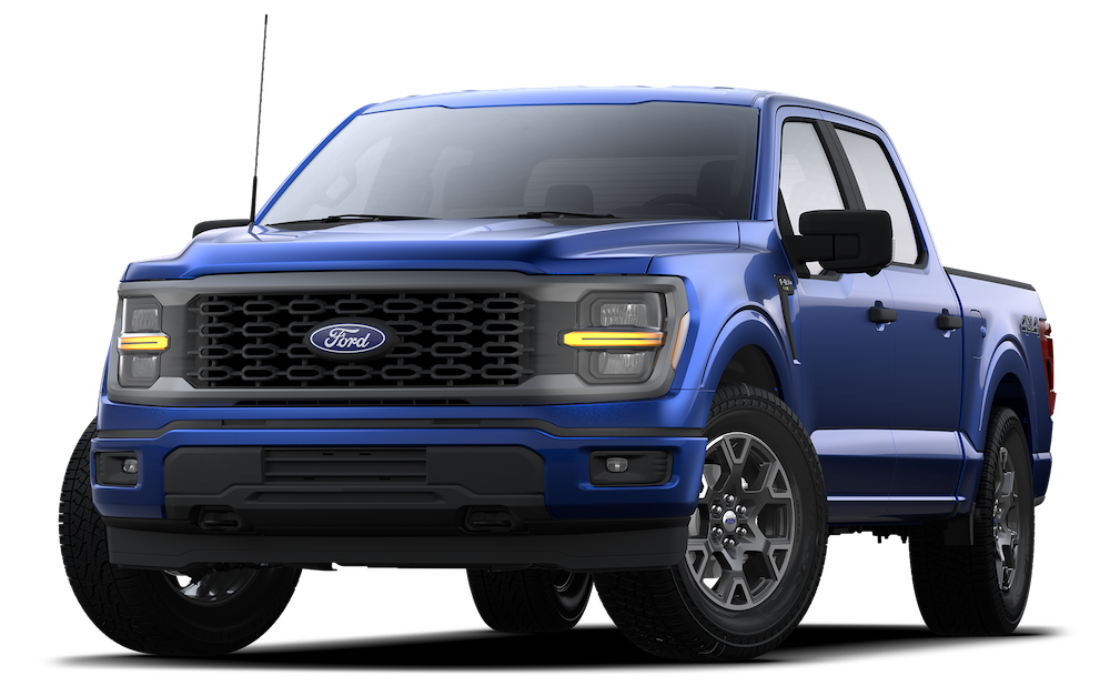 Man driving a 2025 Ford F-150® King Ranch® showing the center stack display screen