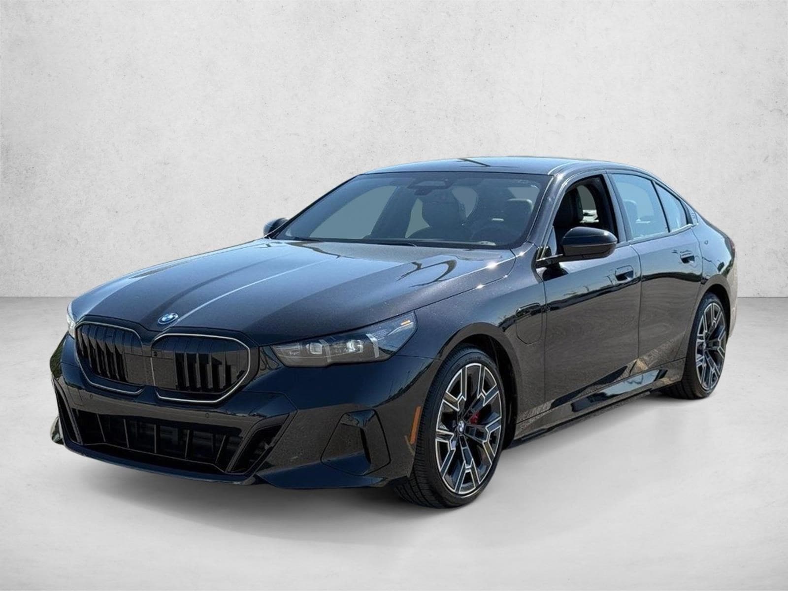 2026 BMW 5 Series 550e xDrive Sedan's photo