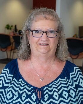 Staff member Grace Huff from ID_4e8e8147f846