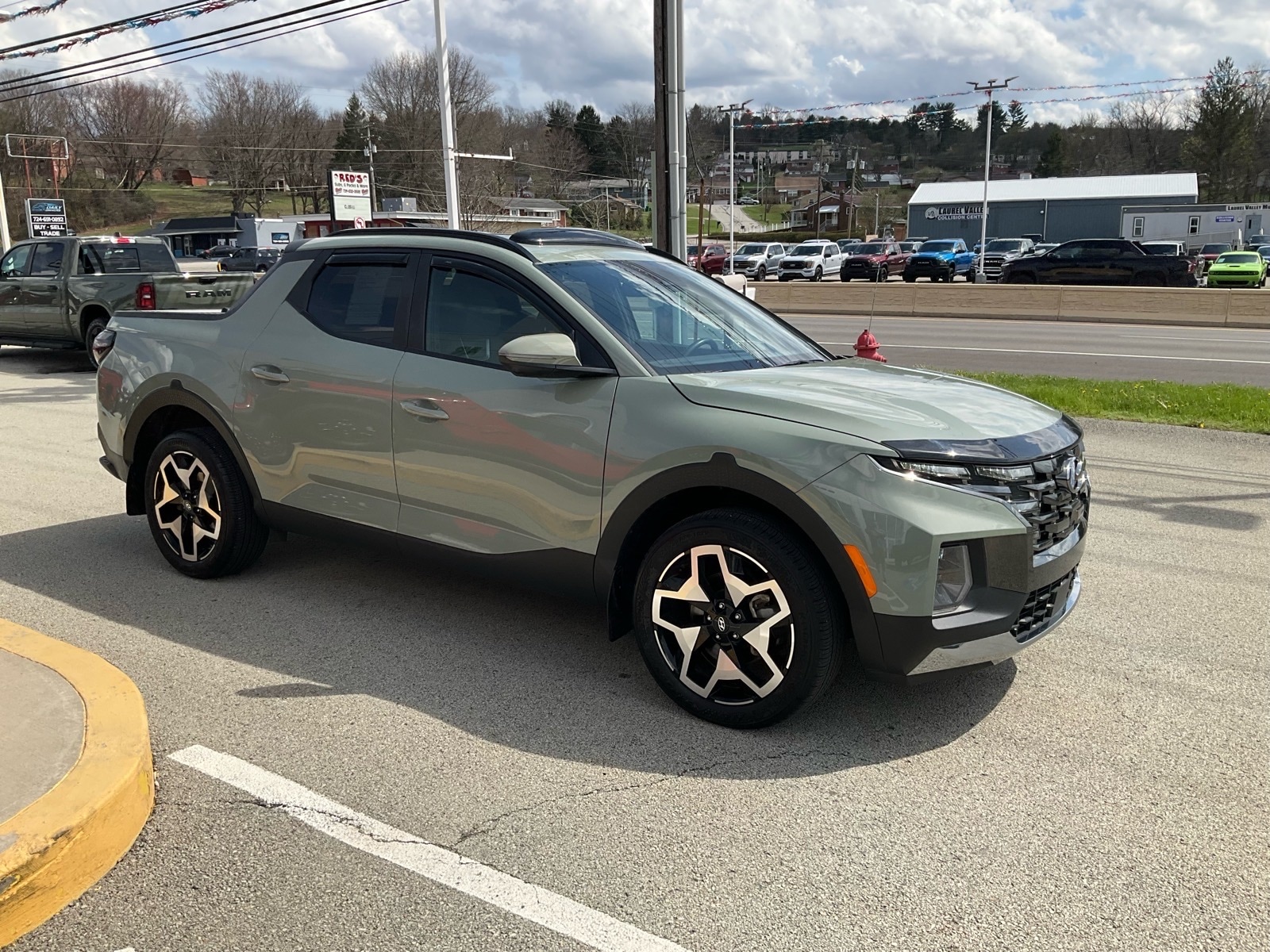 View vehicle photo 3