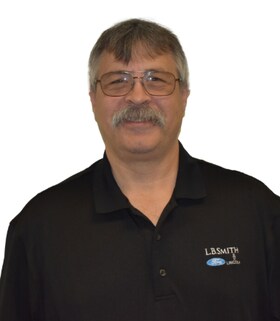 Staff member Tim Fister from e596c711b320