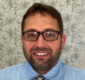 Staff member Shane Manson from ID_ae305c