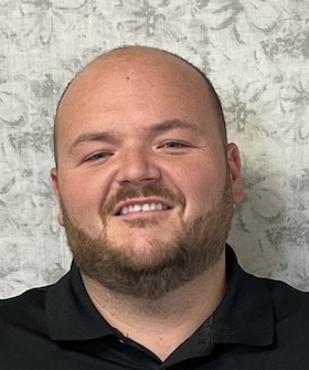 Staff member David Carter from ID_96085d64c1a0