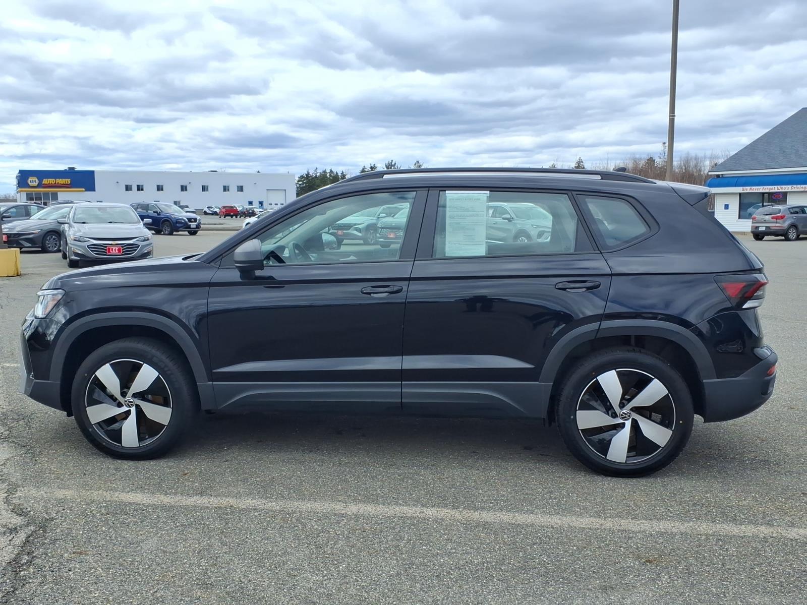 used 2025 Volkswagen Taos car, priced at $26,093