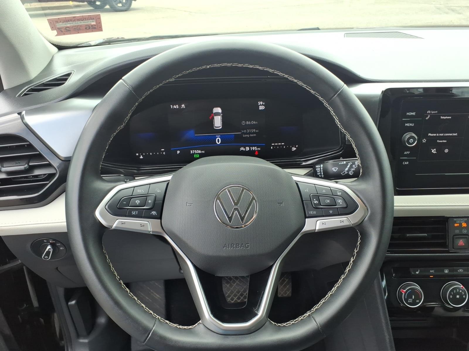 used 2025 Volkswagen Taos car, priced at $26,093