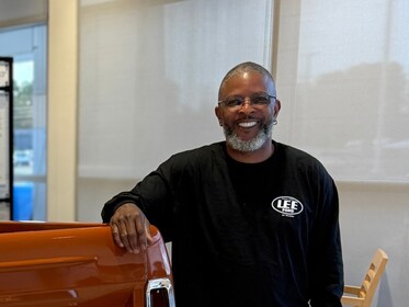 Staff member Chris Simms from 64cac7eb31a4