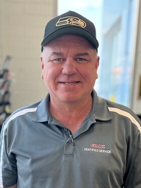 Staff member JOHN OLSON from 751740f90779