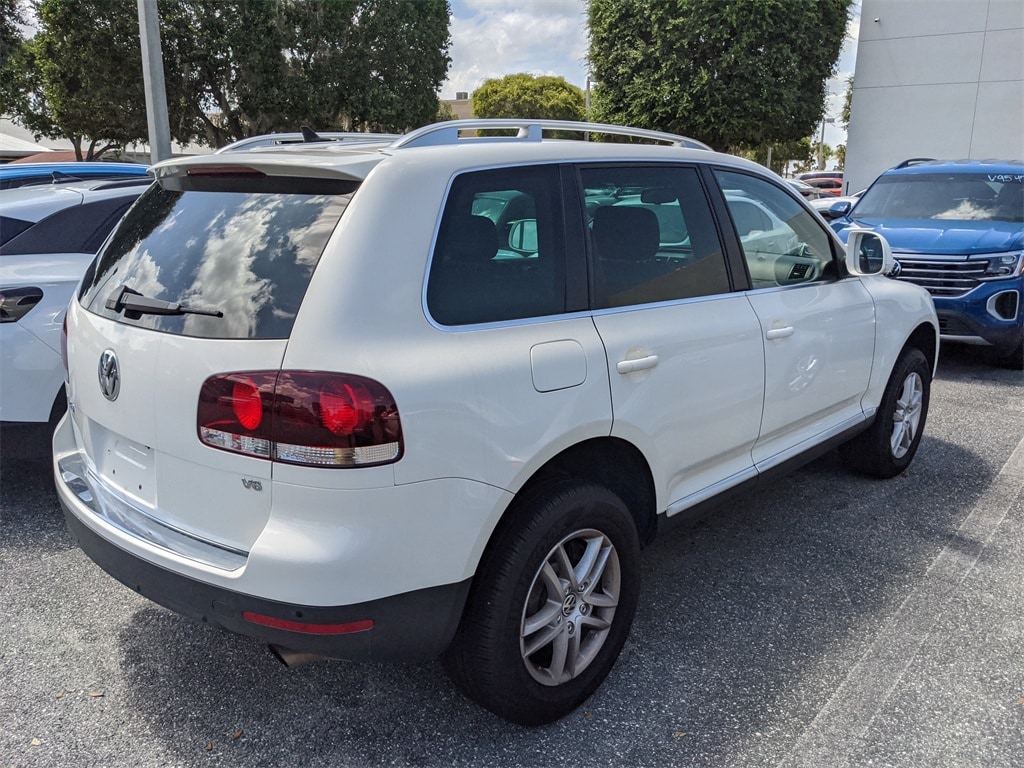 Used 2010 Volkswagen Touareg VR6 with VIN WVGBF7A9XAD002616 for sale in Leesburg, FL