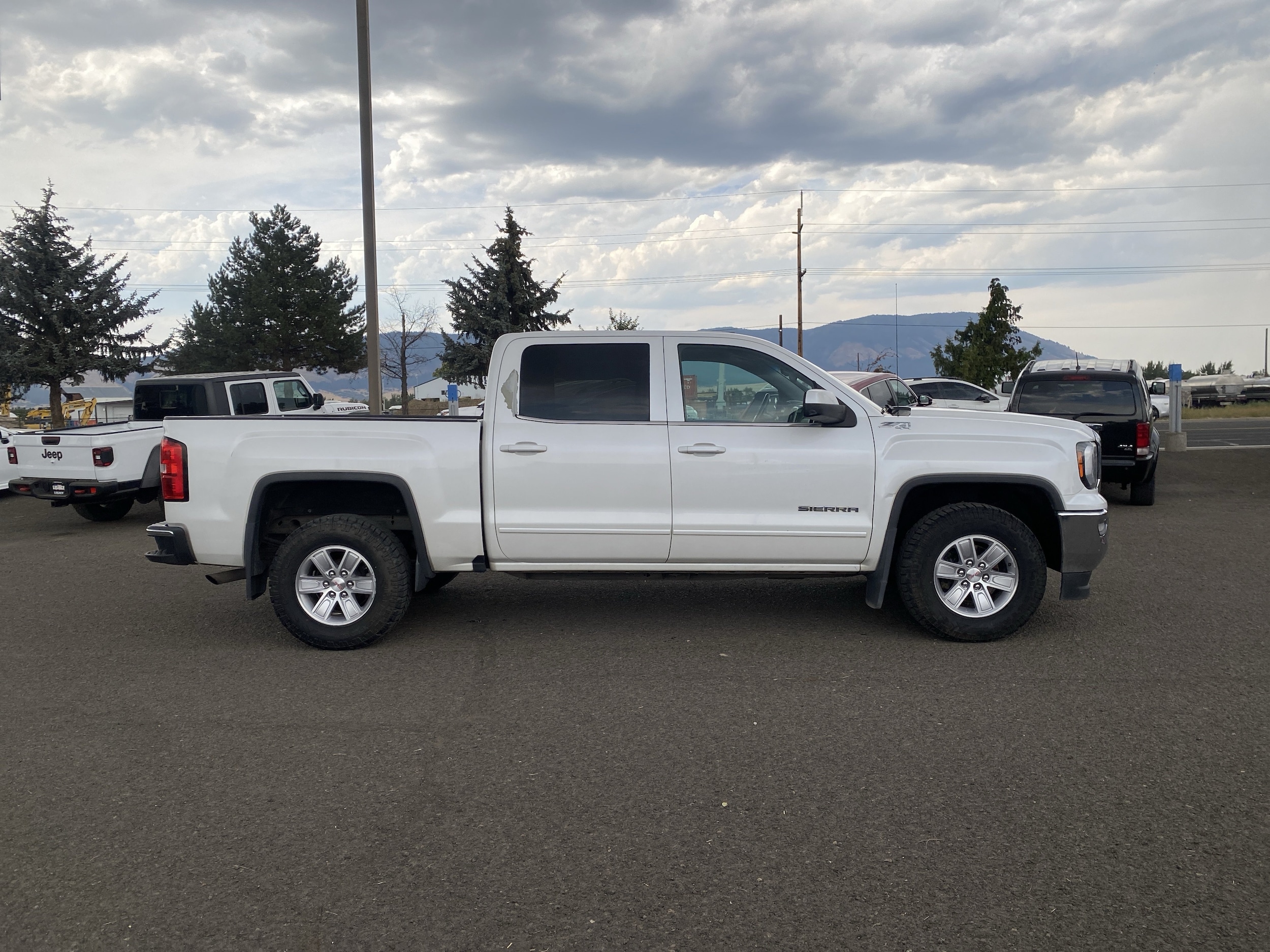 Used 2016 GMC Sierra 1500 SLE with VIN 3GTU2MEC7GG320203 for sale in Island City, OR