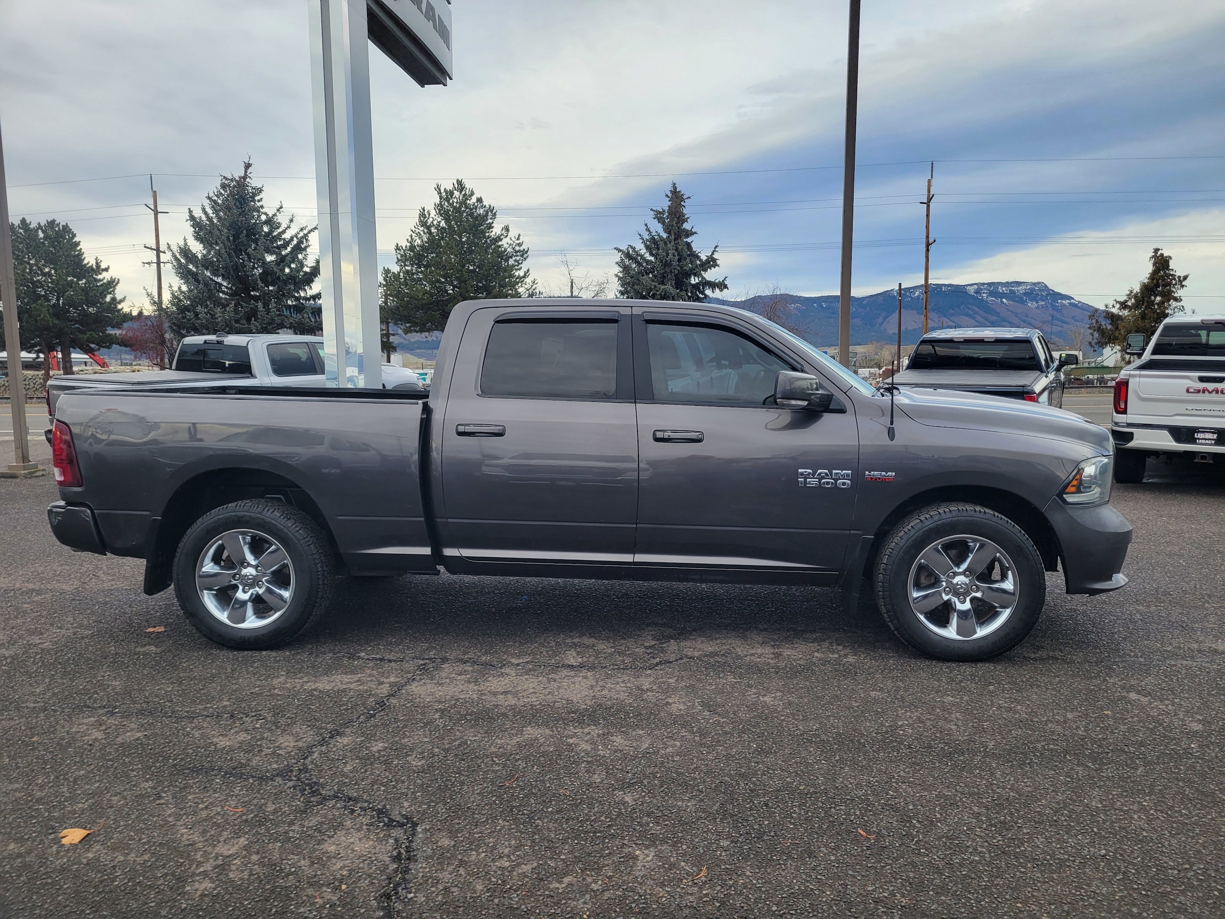 Used 2014 RAM Ram 1500 Sport with VIN 1C6RR7UTXES345940 for sale in Island City, OR