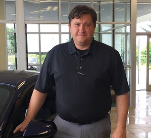 Staff member Dustin Hammons from ec53bf043c0b