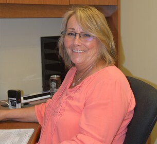 Staff member Marie Caldwell from ec53bf043c0b