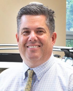 Staff member Tom King from ID_d076910489ea