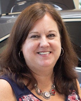 Staff member Lorraine Rizzon from ID_9af9fbb29404