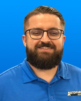 Staff member Andrew Coste from ID_a8dba3b0d834