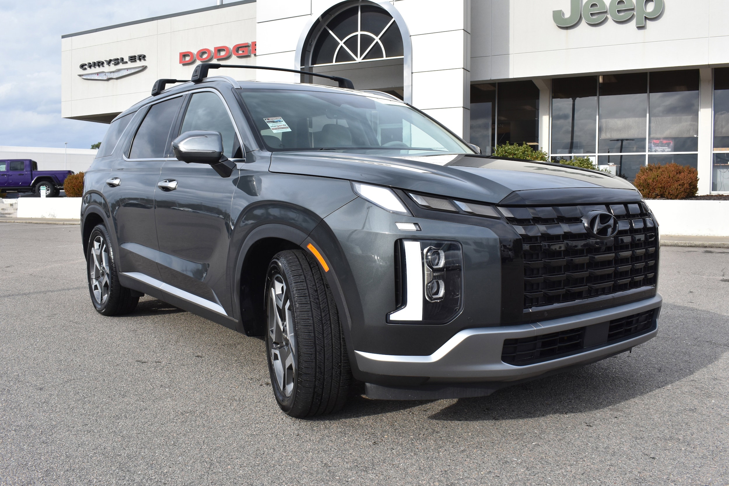 View vehicle photo 3