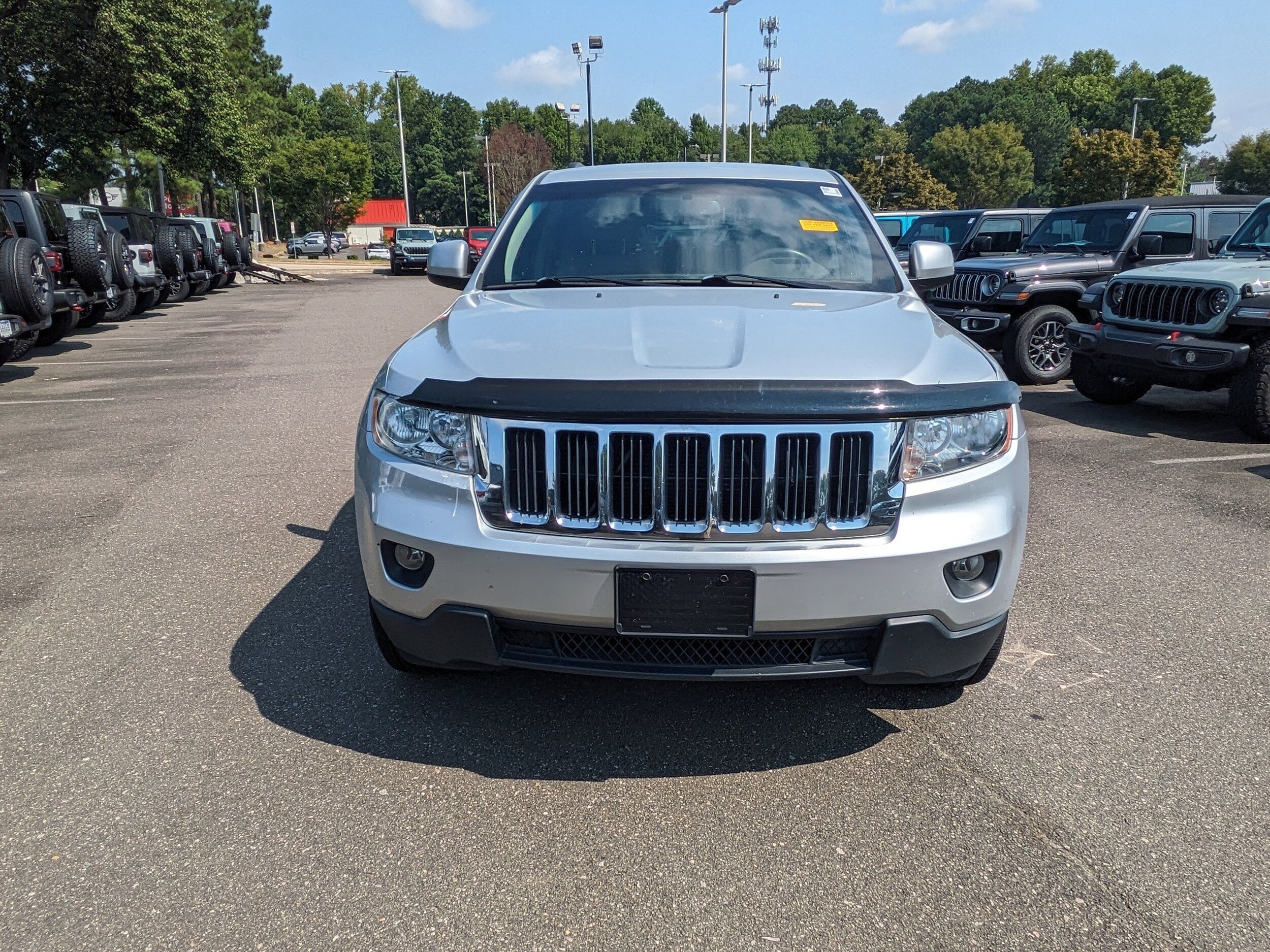 Used 2012 Jeep Grand Cherokee Laredo with VIN 1C4RJFAG5CC317455 for sale in Raleigh, NC