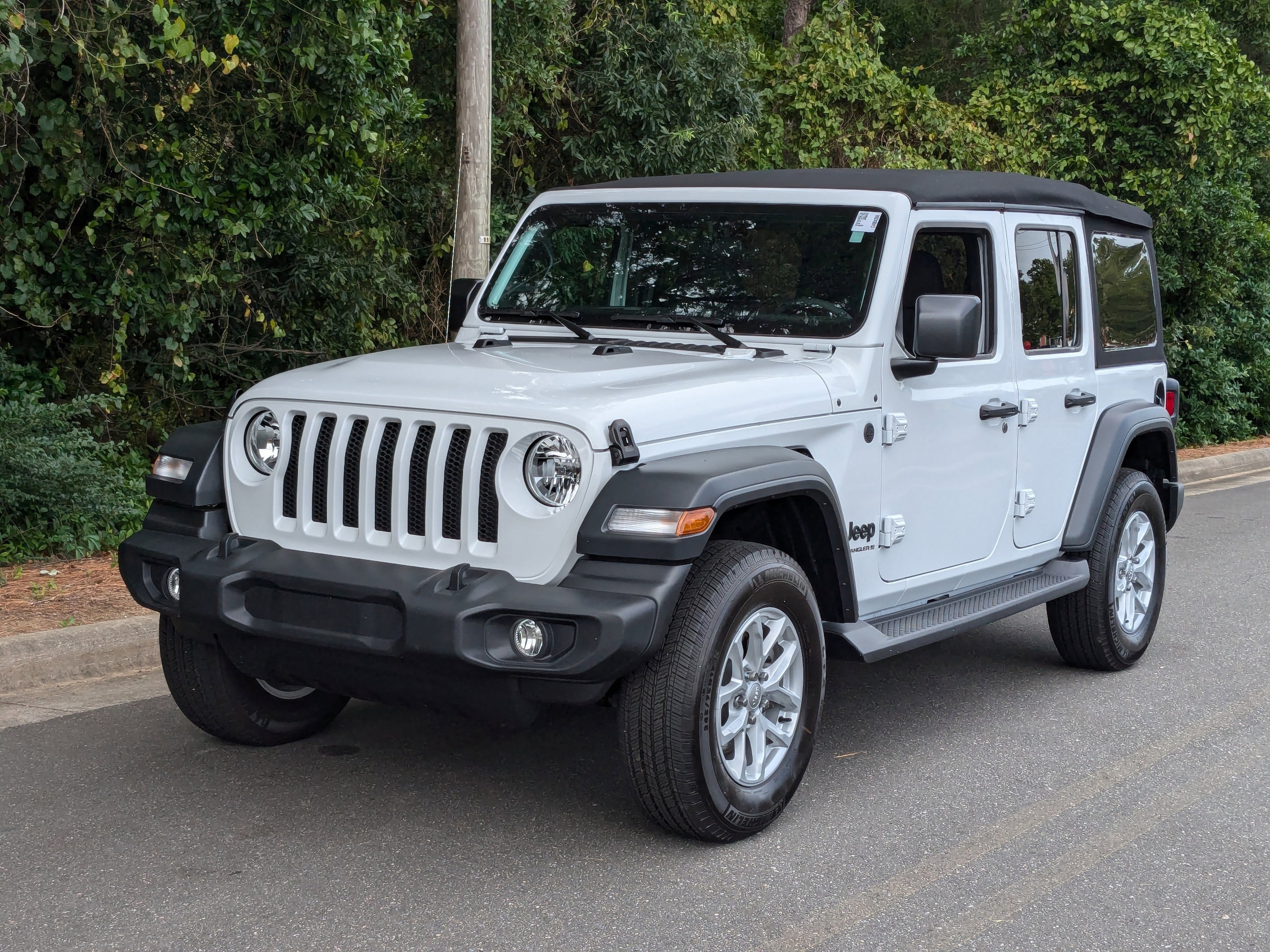 Used 2023 Jeep Wrangler 4-Door Sport S with VIN 1C4HJXDG9PW640778 for sale in Apex, NC