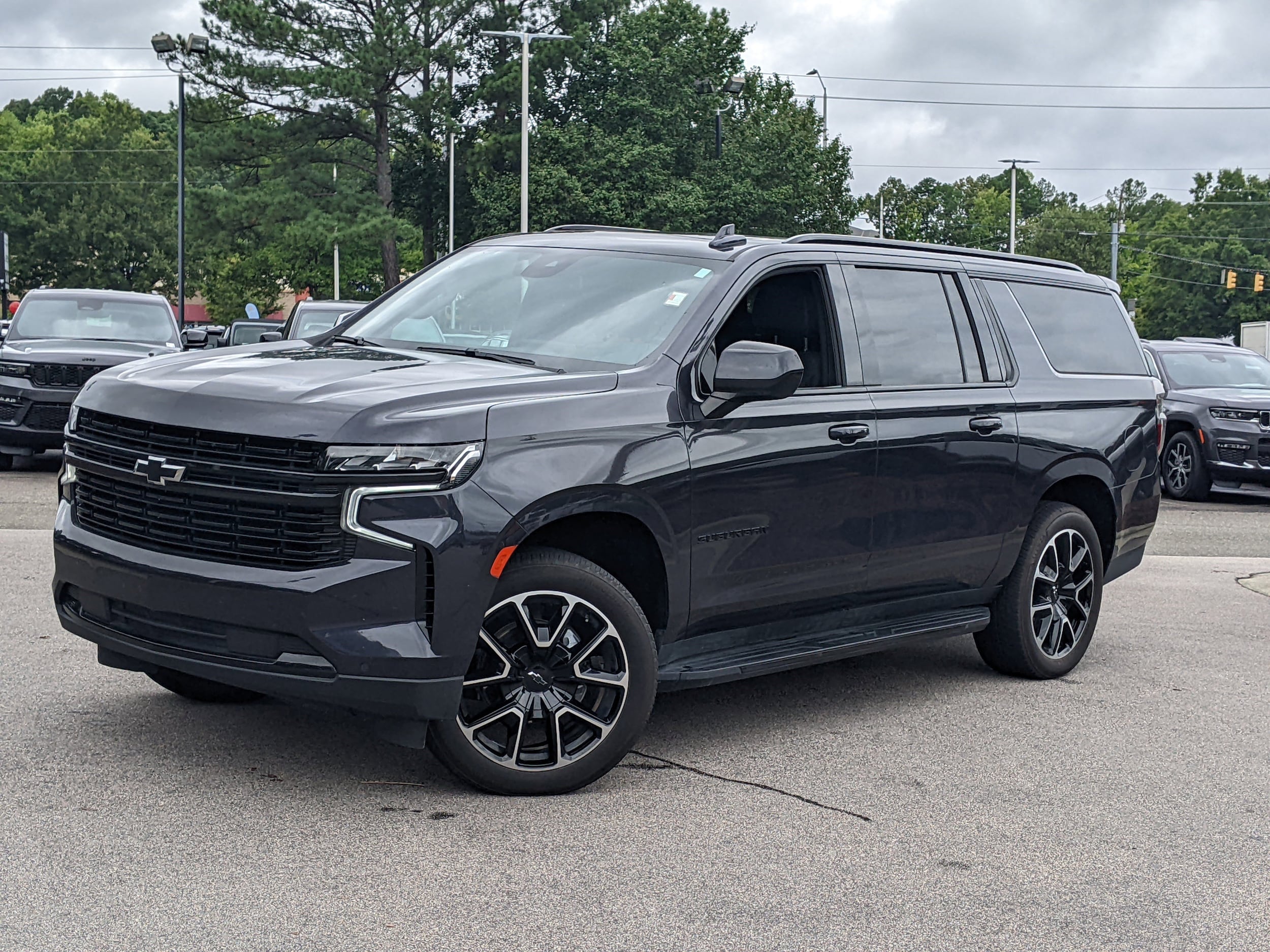 Used 2023 Chevrolet Suburban RST with VIN 1GNSKEKD6PR165645 for sale in Cary, NC