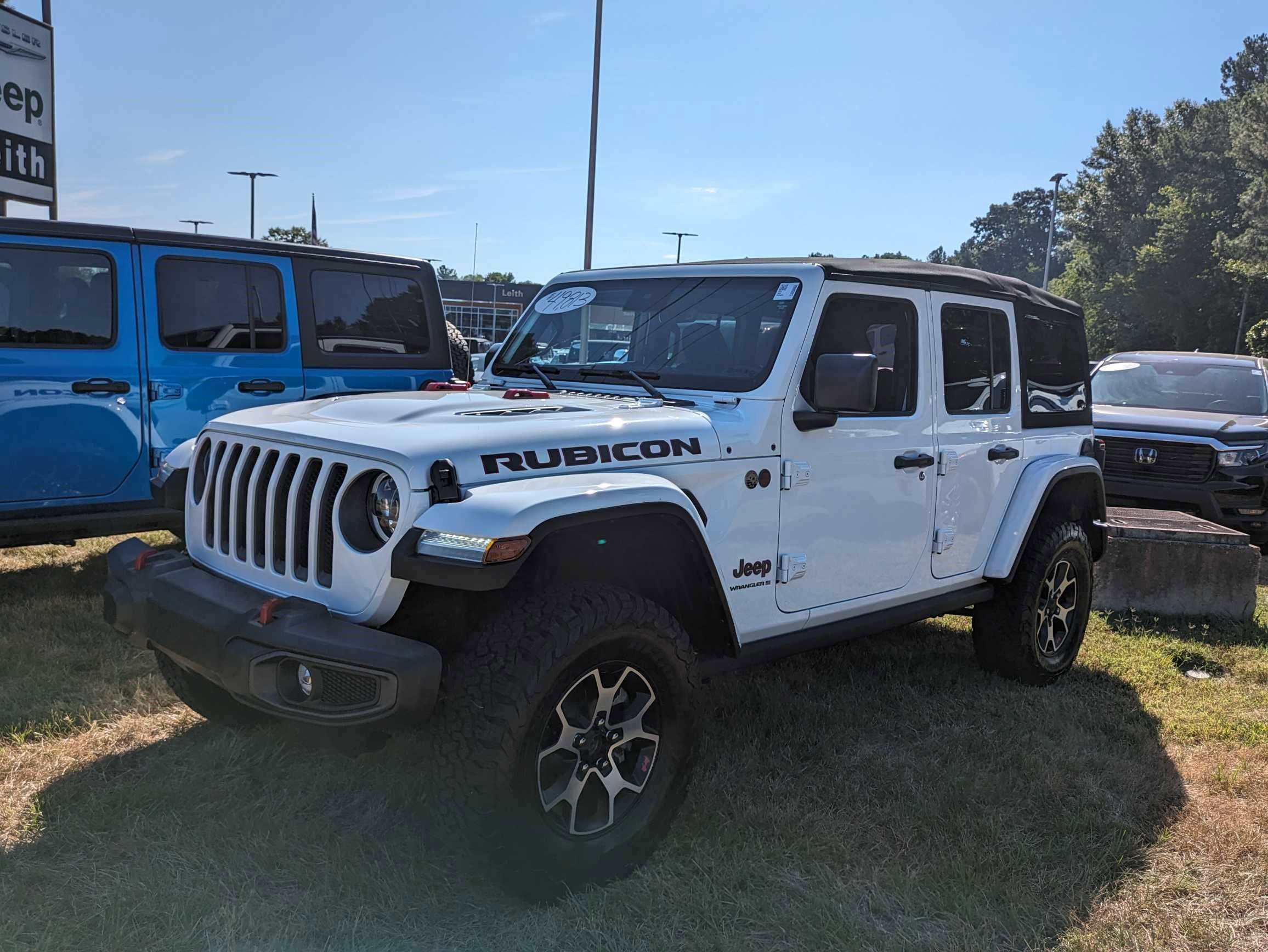 Used 2023 Jeep Wrangler 4-Door Rubicon with VIN 1C4HJXFN2PW500647 for sale in Apex, NC