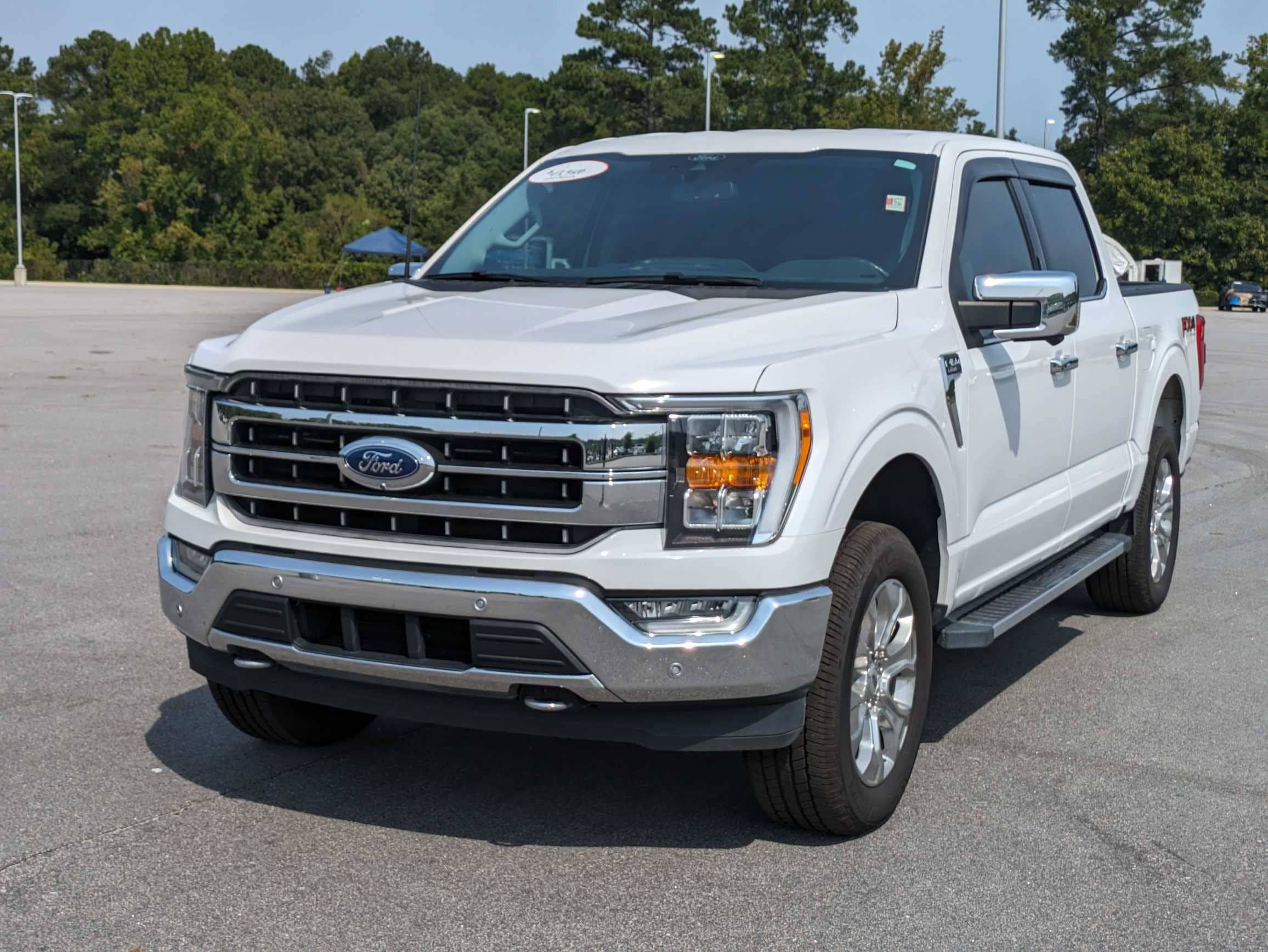 Used 2021 Ford F-150 Lariat with VIN 1FTFW1E86MKD67945 for sale in Raleigh, NC