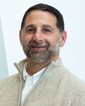 Staff member Charlie Kline from ID_a264f384cde1