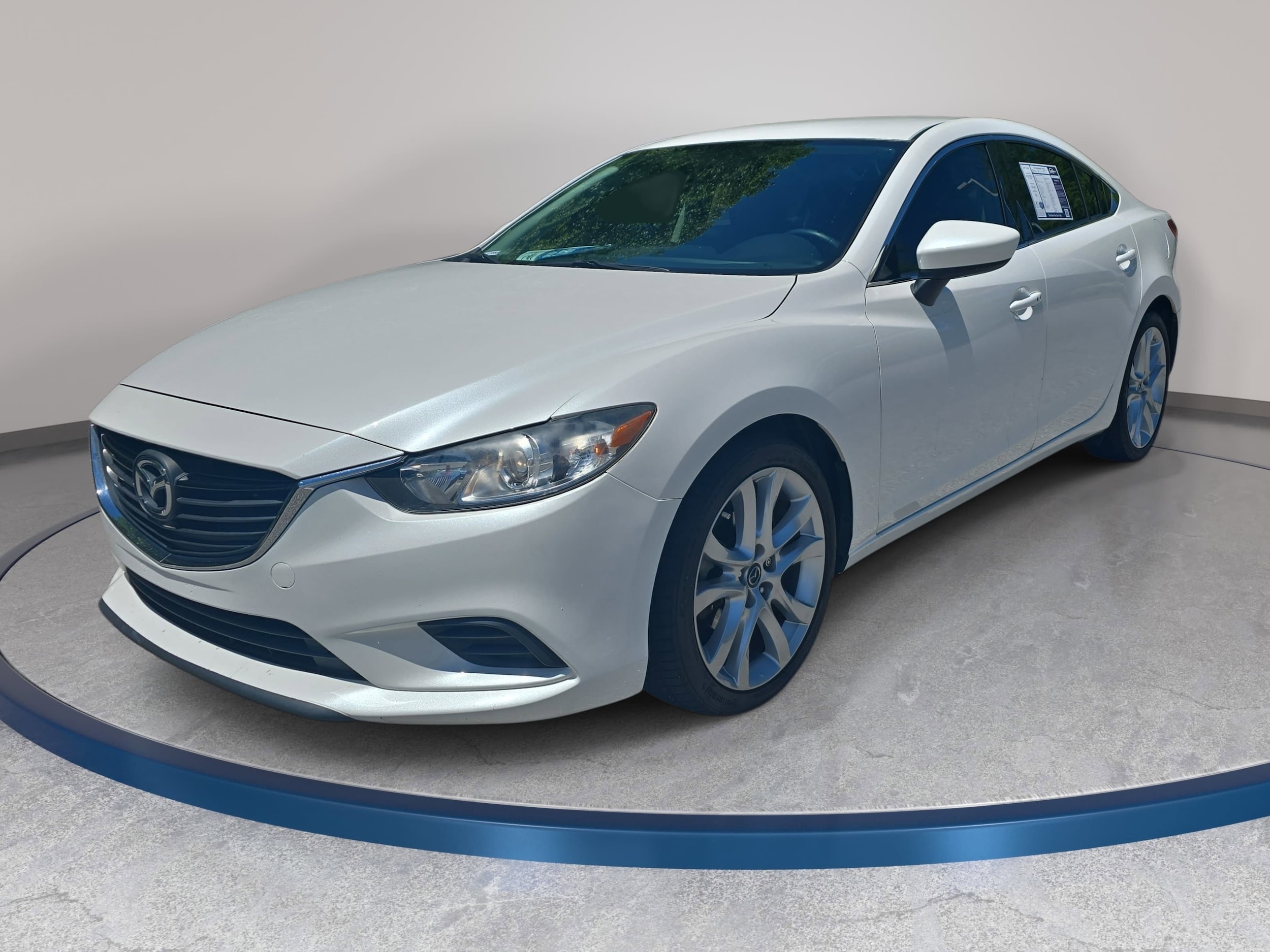 2015 Mazda EZ-6 i Touring Auto's photo