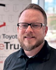 Staff member Joseph Holden from ID_37a494352b80