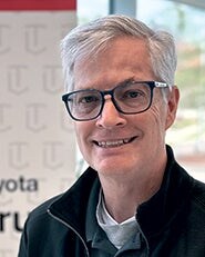 Staff member John Dagilis from ID_37a494352b80