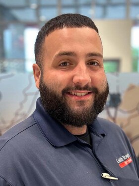 Staff member Charles Adler from ID_a2b365505163