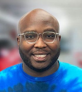 Staff member Andrew Ward from ID_78b1d87b4507