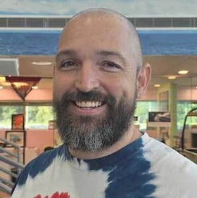 Staff member Casey Braswell  from ID_d714a2d0df1f