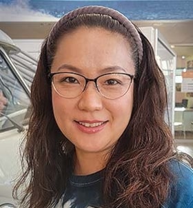 Staff member Christy Suh from ID_d714a2d0df1f