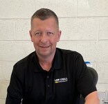 Staff member Lukasz Josefkowicz from ID_1dee64