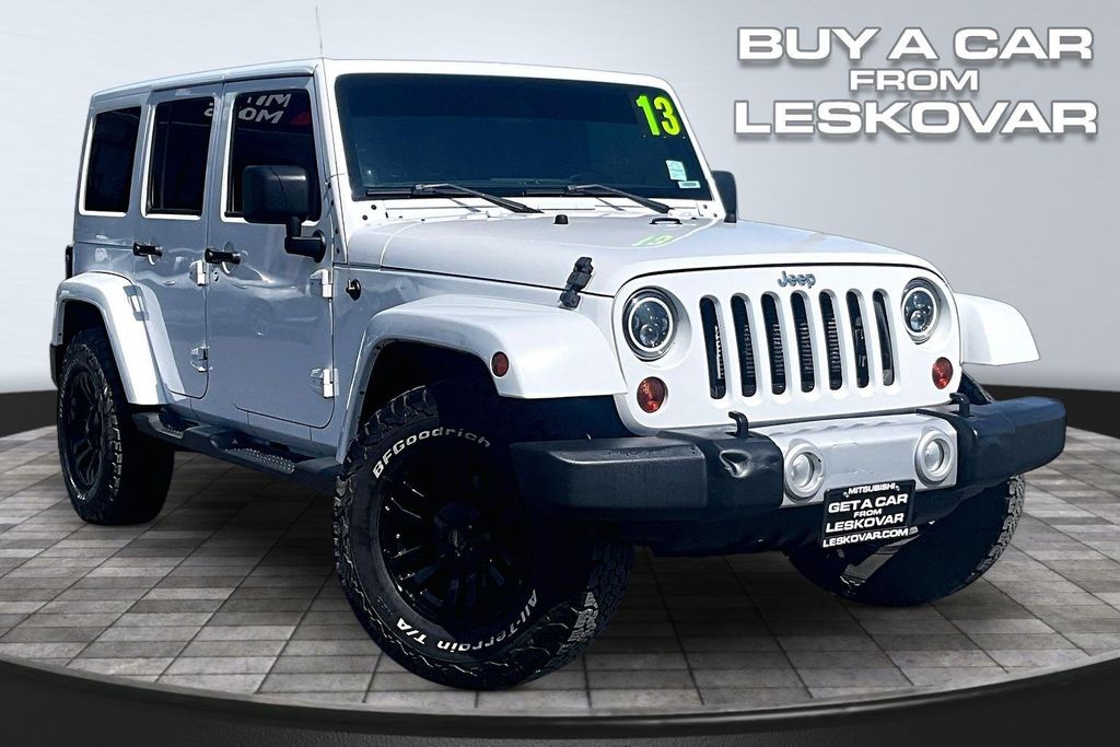 Used 2013 Jeep Wrangler Unlimited Sahara with VIN 1C4BJWEG5DL557537 for sale in Kennewick, WA