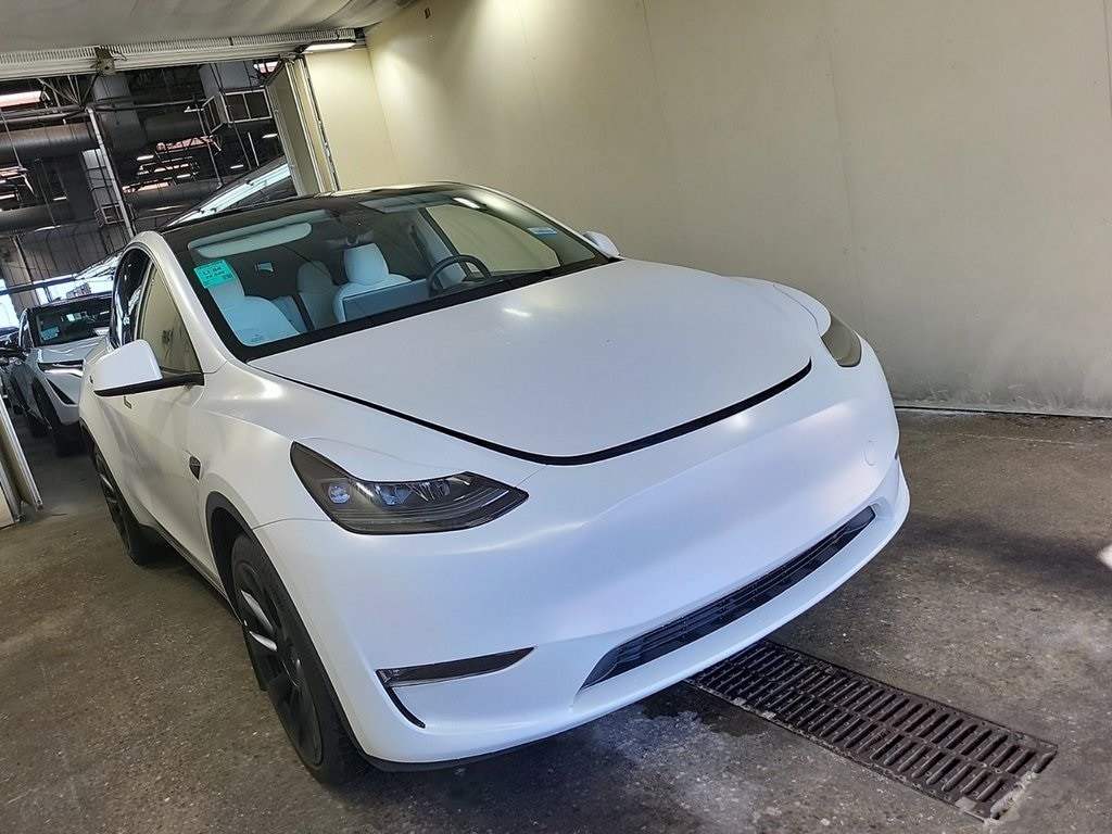 Used 2022 Tesla Model Y Long Range with VIN 7SAYGDEE7NF523862 for sale in Kansas City