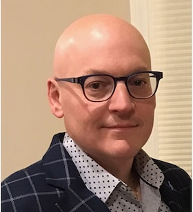 Staff member Kerry Monica, Sr from ID_975bd8