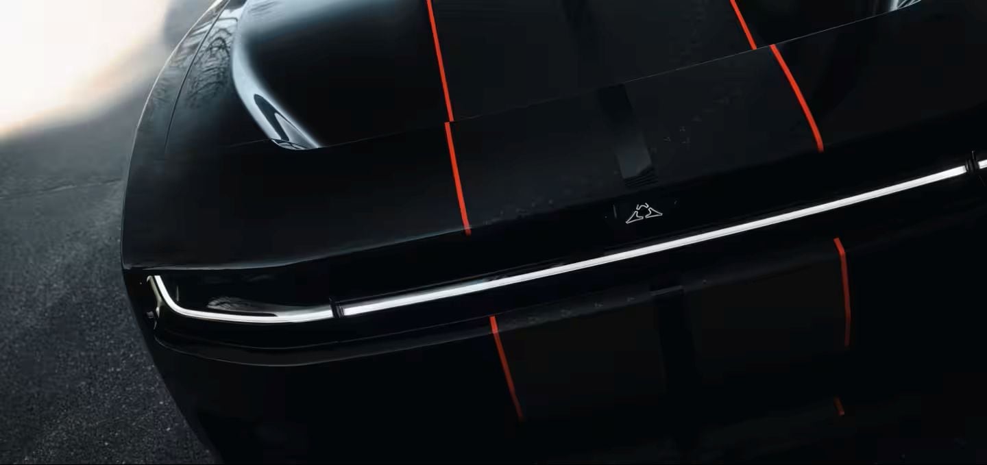 2027 Dodge Charger sleek black front exterior with bright red lines