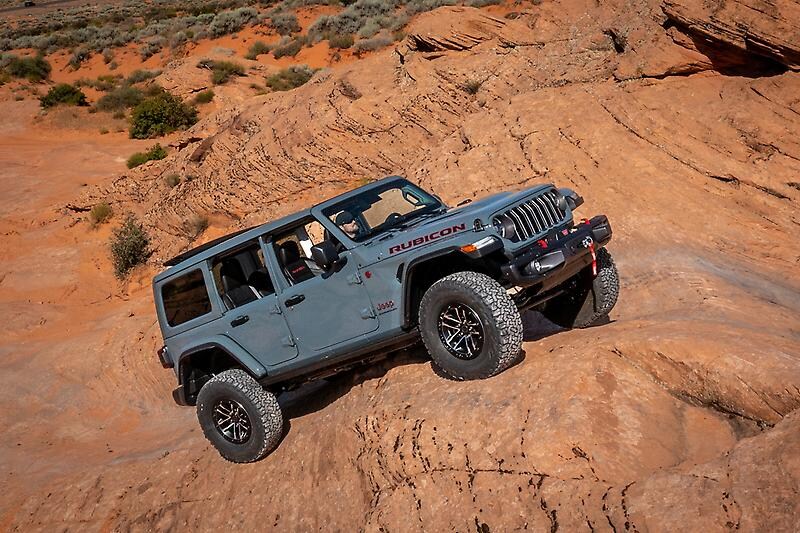 2026 Jeep Wrangler demonstrating its trail geometry by climbing up steep terrain