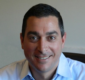 Staff member John Perillo, Jr from 5a71ee4c776f