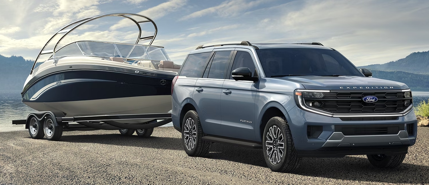 Ford Expedition Towing Boat out of lake