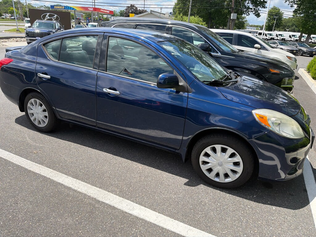 Used 2014 Nissan Versa SV Sedan