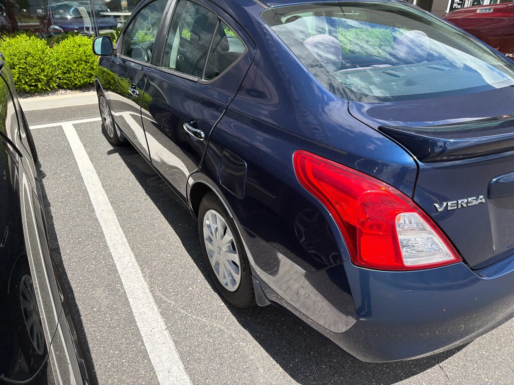 Used 2014 Nissan Versa SV Sedan