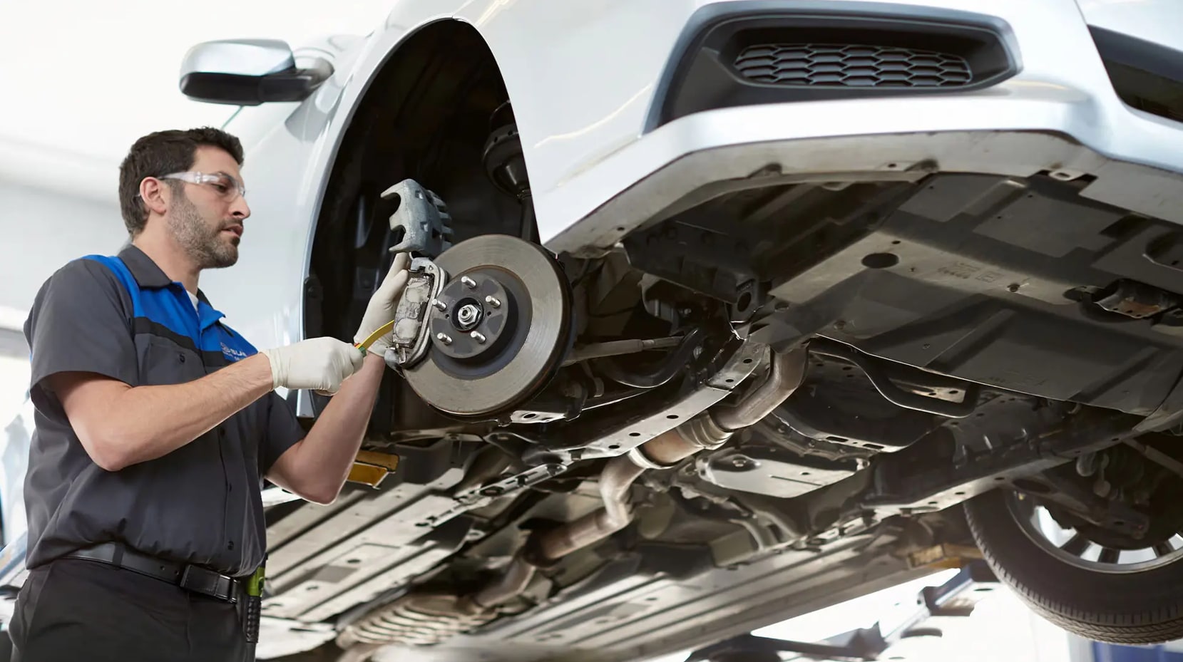 Subaru vehicle undergoing maintenance and service at Lester Glenn Subaru service center in Toms River, NJ