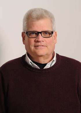 Staff member Sam Johnson from ID_0182263573ea