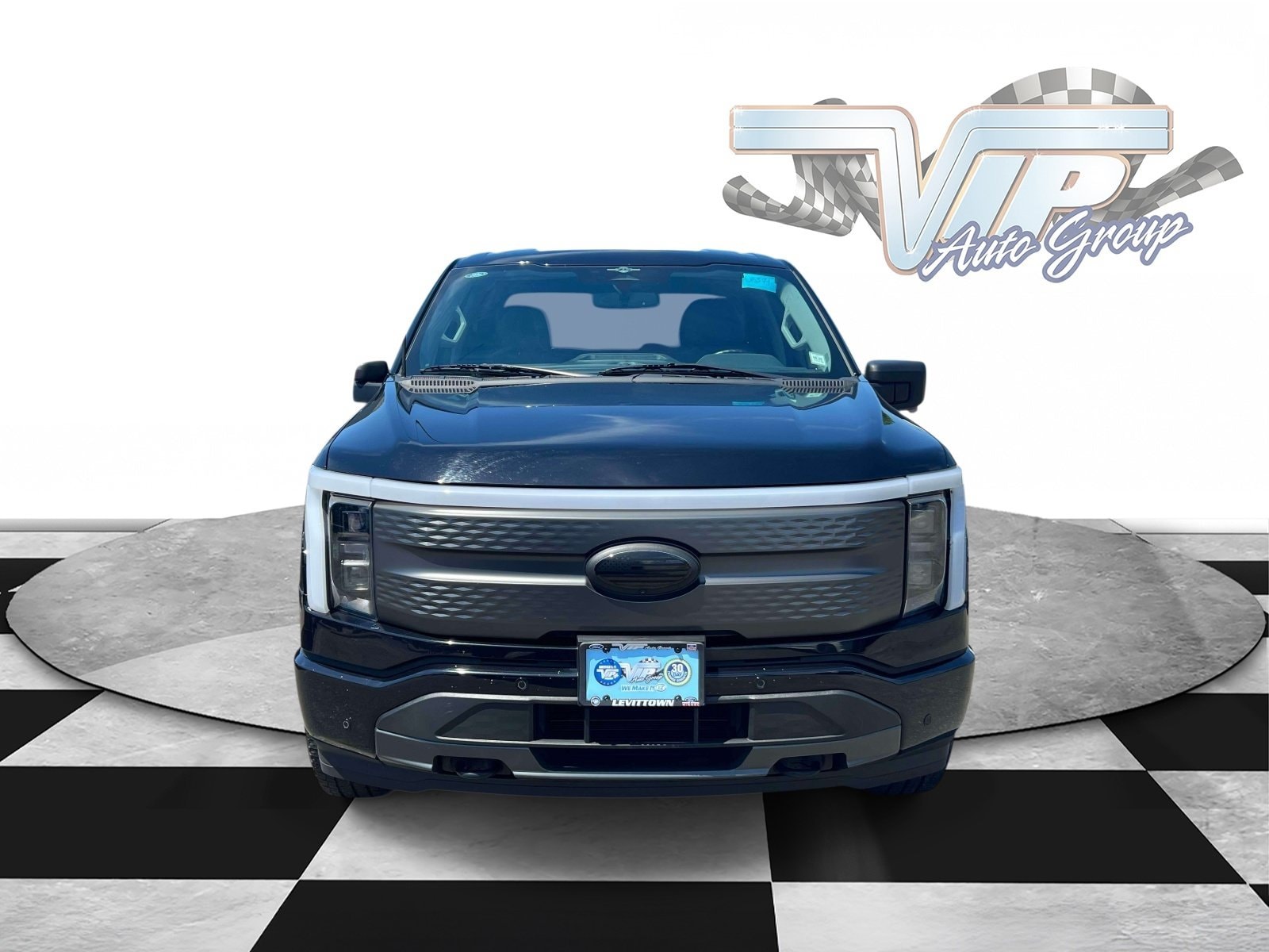 Used 2023 Ford F-150 Lightning XLT with VIN 1FTVW1EL8PWG60176 for sale in Levittown, NY